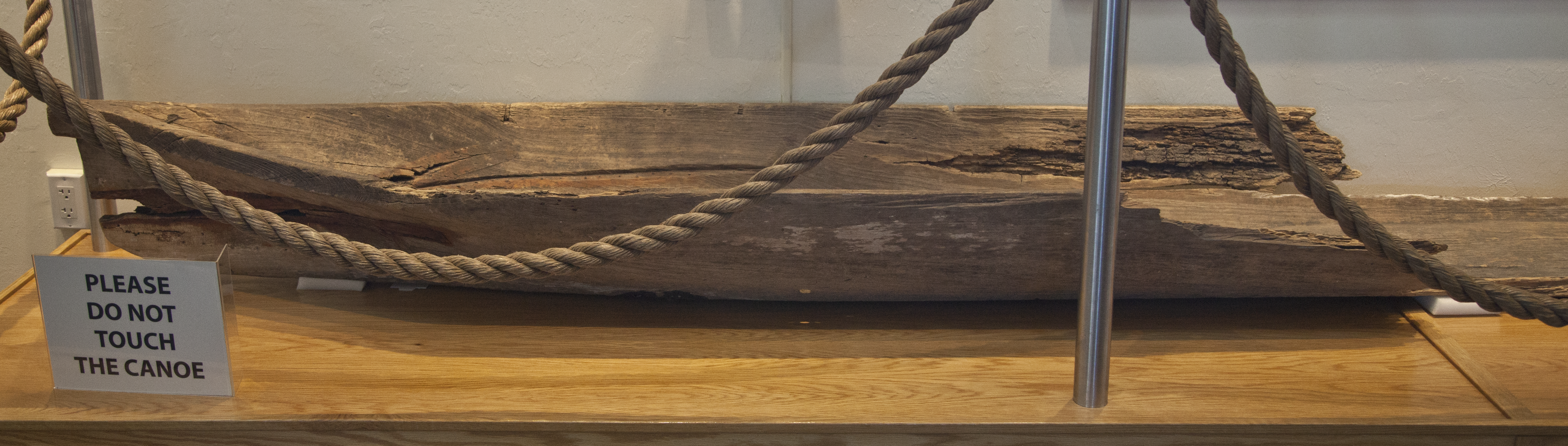 Wooden Dugout Canoe on Display Behind Rope | ClipPix ETC: Educational 