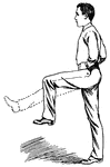 Man stretching his knees by raising them forward.