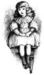 A young girl sitting on a table