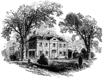 Image of a plantation house surrounded by trees.
