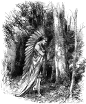 A male Native American with a large, feathered headdress walks through the woods.