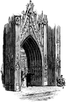 An image of an ornate door, possibly to a Gothic style church.