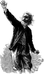 An old man with his right arm raised up high. He has a beard and unkempt hair.