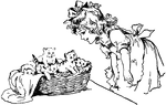 A a young girl stoops over to admire a basketful of kittens. The girl appears to be happy. She has a large bow in her curly hair and is wearing a pinafore over her dress.