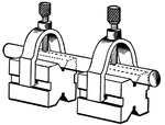 Pair of v blocks. V-Blocks are precision metalworking jigs typically used to hold round metal rods or pipes for performing drilling or milling operations.