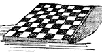 A board for playing checkers, or draughts.