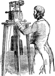 A man operating an electro-magnetic telegraph.