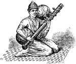 A stringed instrument used in Carnatic music. The vina is played by sitting cross-legged and holding the vina in front of oneself. The small gourd on the left rests on the left thigh, the left arm passing beneath and hand curved round the stem so that the fingers rest upon the frets. The vina's main body is placed on the ground, partially supported by the right thigh.