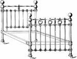 An ornamental bed frame made out of iron.