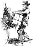 A man loading a cart full of goods.