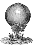 A hot air balloon on the ground surrounded by men.