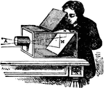 "An optical instrument employed for exhibiting the images of objects in their forms and colors, so that they may be traced and a picture drawn, or may be represented by photography. A simple camera obscura is presented by a darkened chamber into which no light is permitted to enter excepting by a small hole in the window-shutter. A picture of the objects opposite the hole will then be seen on the wall or on a white screen placed opposite the opening." &mdash; Winston's Encyclopedia, 1919