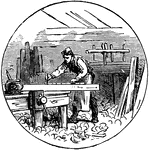 A carpenter measuring wood.
