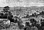 An image of a town viewed from upon a hill.