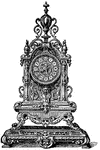 A bronze clock stand from the style of Henry II.