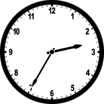 Round clock with numbers showing time 2:35