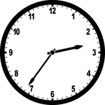 Round clock with numbers showing time 2:36