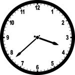 Round clock with numbers showing time 3:38