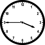 Round clock with numbers showing time 3:45