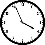 Round clock with numbers showing time 3:56