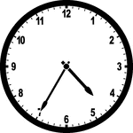 Round clock with numbers showing time 4:35