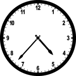 Round clock with numbers showing time 4:37