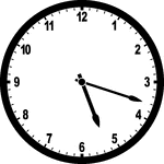 Round clock with numbers showing time 5:18
