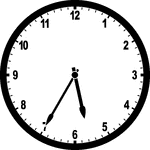 Round clock with numbers showing time 5:35