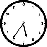 Round clock with numbers showing time 5:36