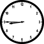 Round clock with numbers showing time 8:45