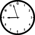 Round clock with numbers showing time 8:57