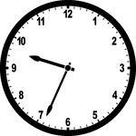 Round clock with numbers showing time 9:34