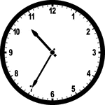 Round clock with numbers showing time 10:35