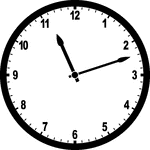 Round clock with numbers showing time 11:12