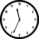 Round clock with numbers showing time 11:34