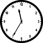 Round clock with numbers showing time 11:35