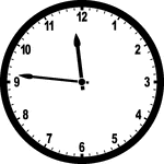 Round clock with numbers showing time 11:46