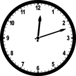 Round clock with numbers showing time 12:12