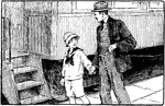 A man and his son walk hand in hand passed a train.