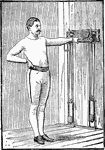 A man exercising with chest weights. In this position, he is pulling his left arm straight down repeatedly. The position is then switched to the right arm.