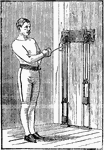 A man exercising with chest weights. In this position, he is extending his left arm straight out repeatedly. The position is then switched to the right arm.