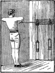 A man exercising with chest weights. In this position, he is pulling the handles toward his chest, together repeatedly.