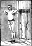 A man exercising with chest weights. In this position, he is extending his arms out together repeatedly.