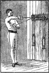 A man exercising with chest weights. In this position, he is moving his right hand up and out while he moves his left hand across his chest.