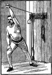 A man exercising with chest weights. In this position, he extends his left arm out vertically.
