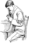 A man looking into a microscope.