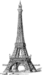 The Eiffel Tower, a global icon on the Champ de Mars in Paris, France stands 984 feet high.