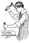 Carpenter using a chisel.