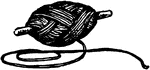 A spool of yarn with a single cord of yarn fallen loose.
