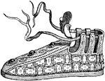 A French shoe of the 9th century, adorned with gems and embroidery.